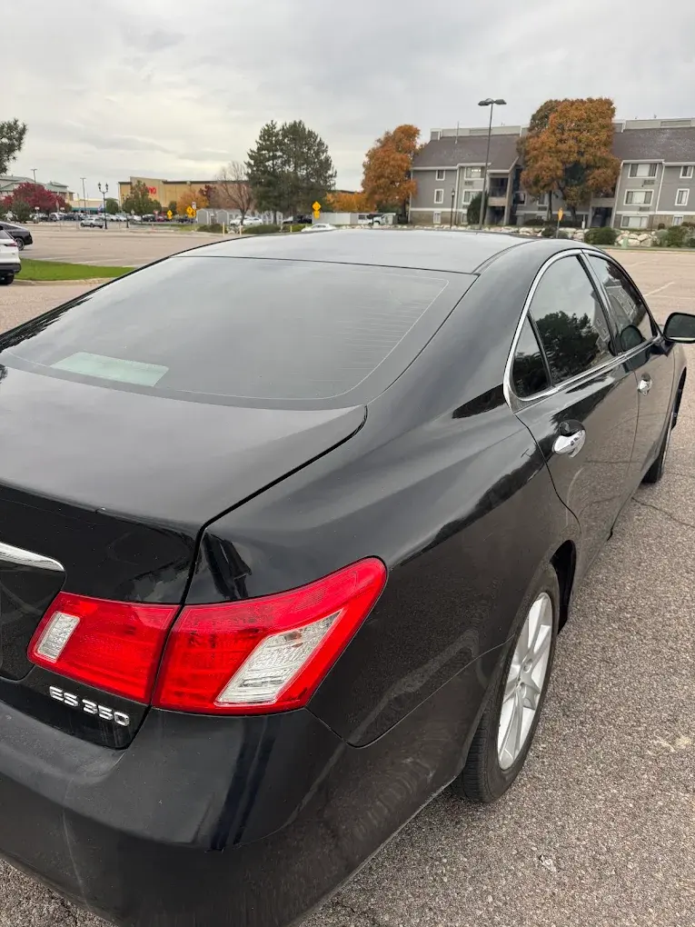 Black Lexus ES 350 with tinted windows