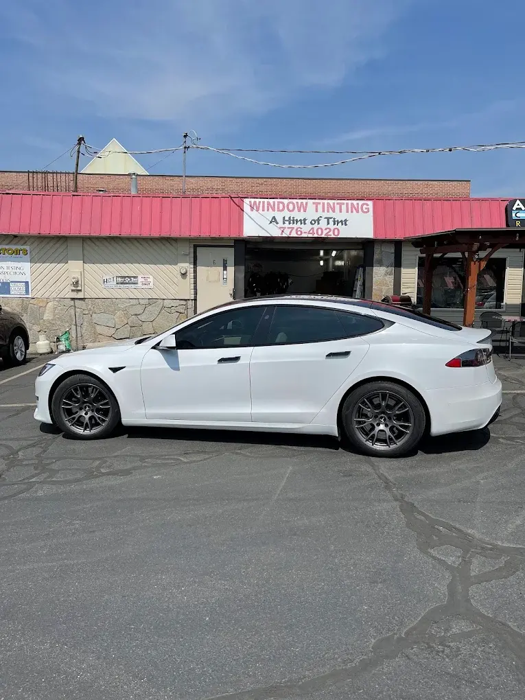 White Tesla Model S with tinted windows