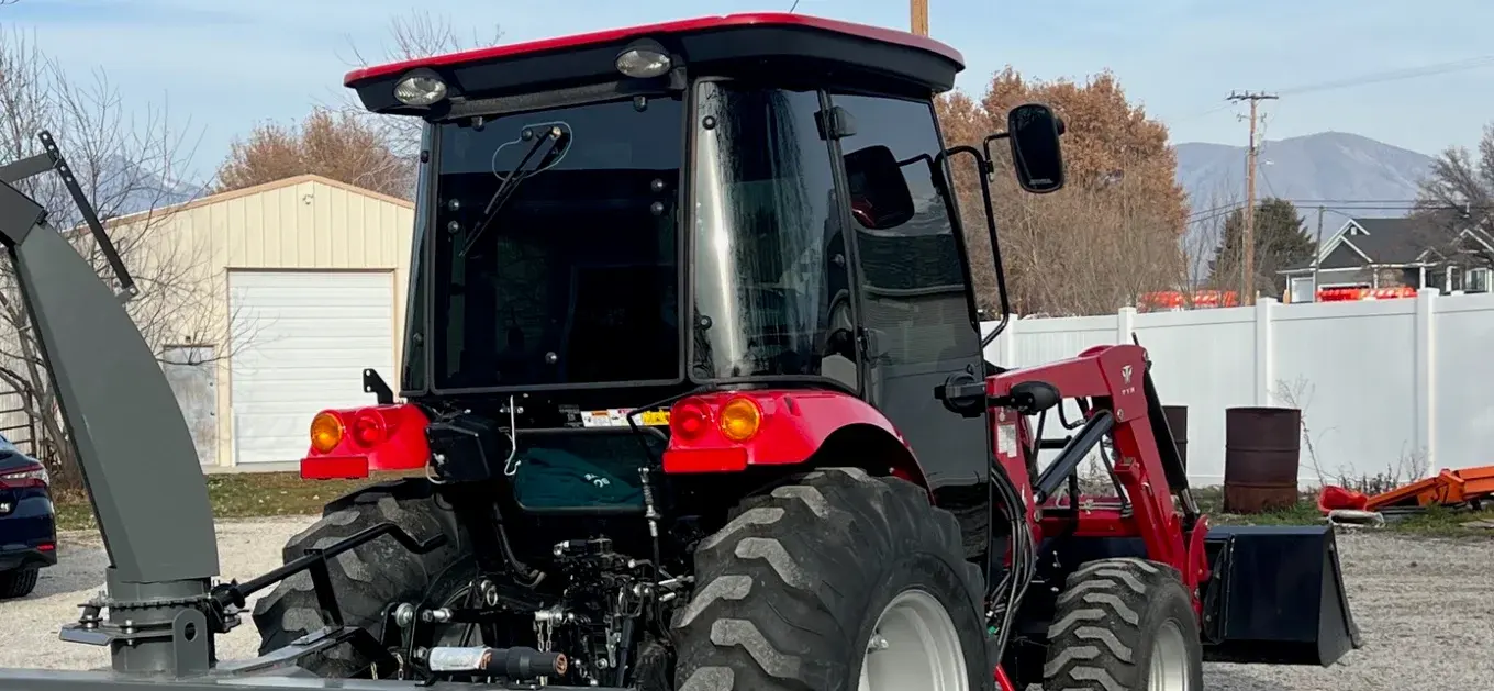 Tractor cab with tinted glass