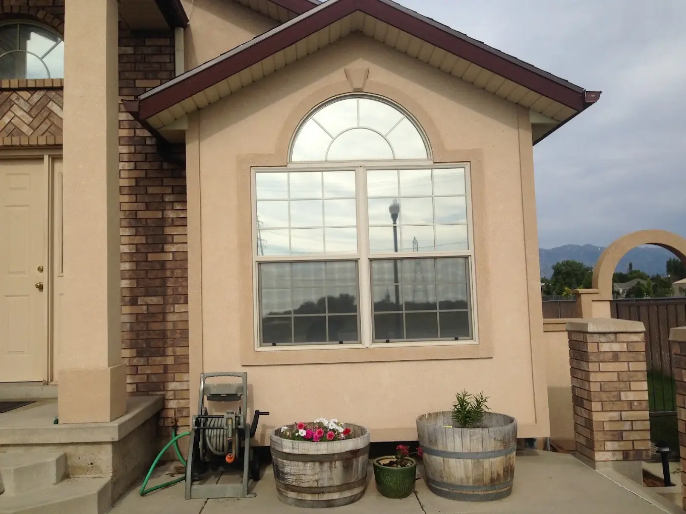 Tinted arched residential window